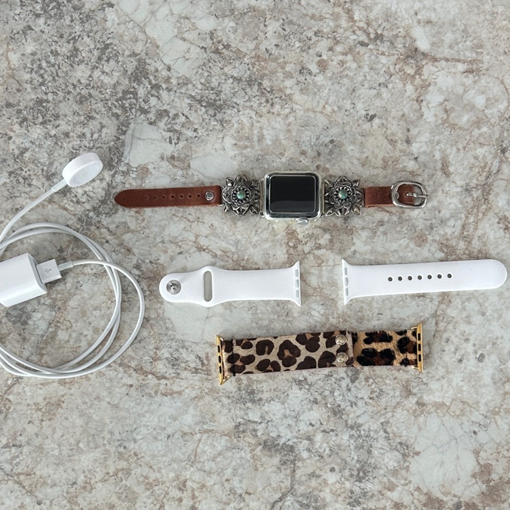 Apple Smartwatch with Brown and White Bands